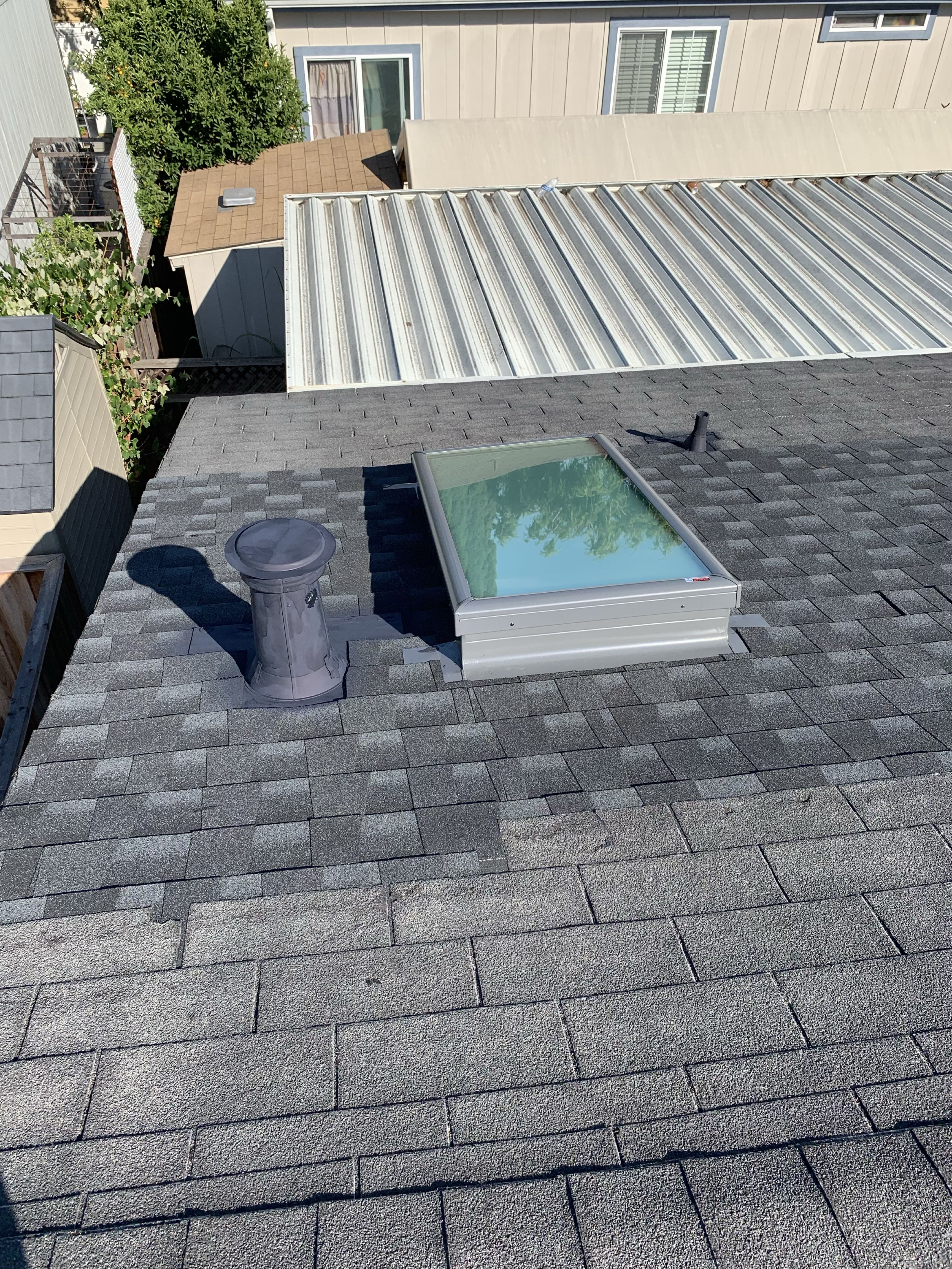 Residential roof with skylight