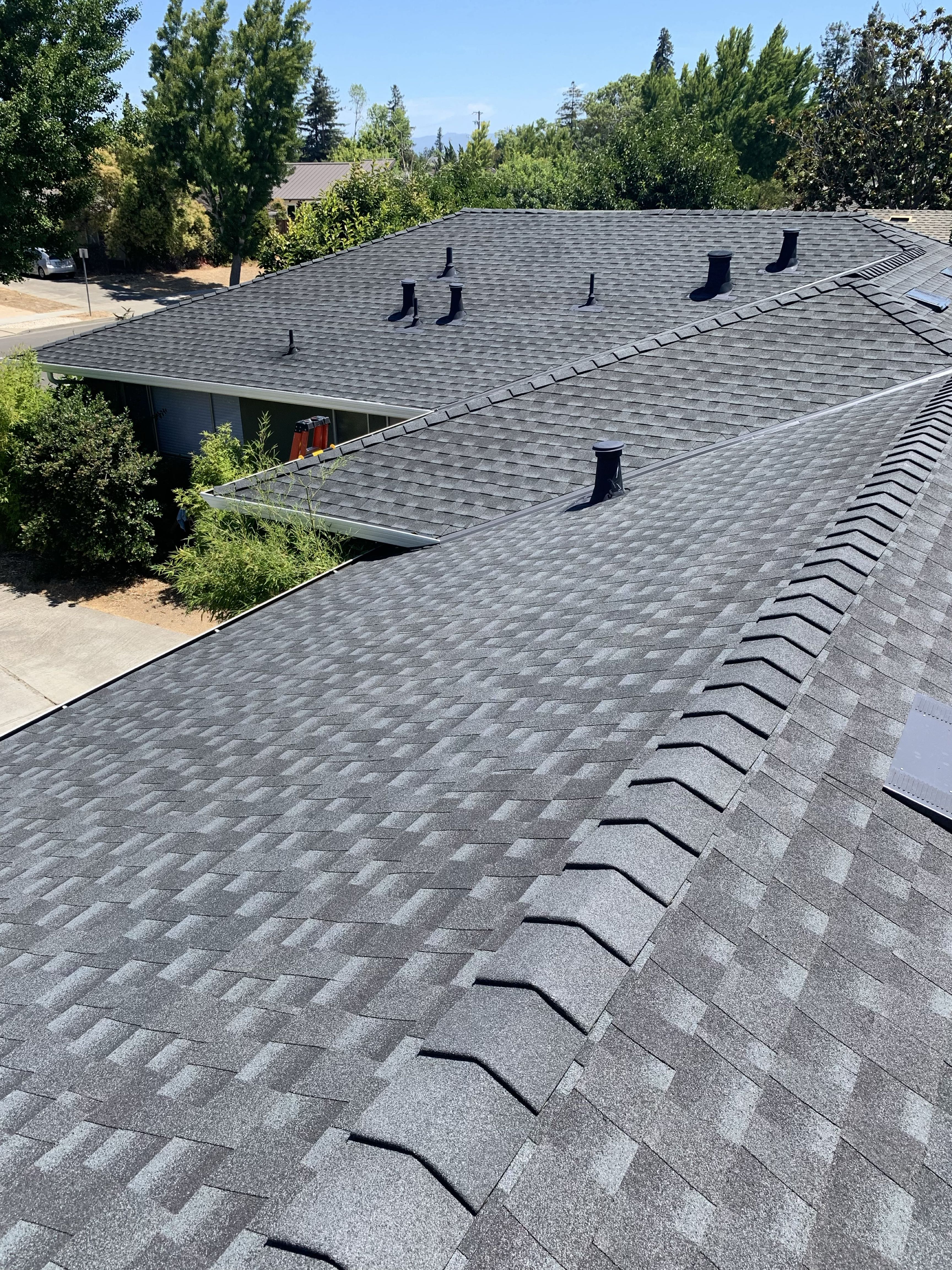 Finished residential composition shingle roof